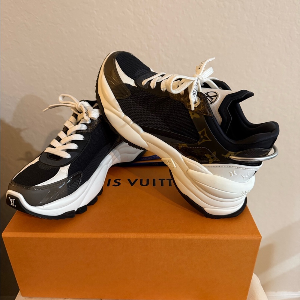 Louis Vuitton Black and White Monogram Sneakers
Run 55 Sneakers